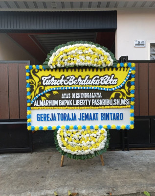 Papan Bunga Duka di Wereka